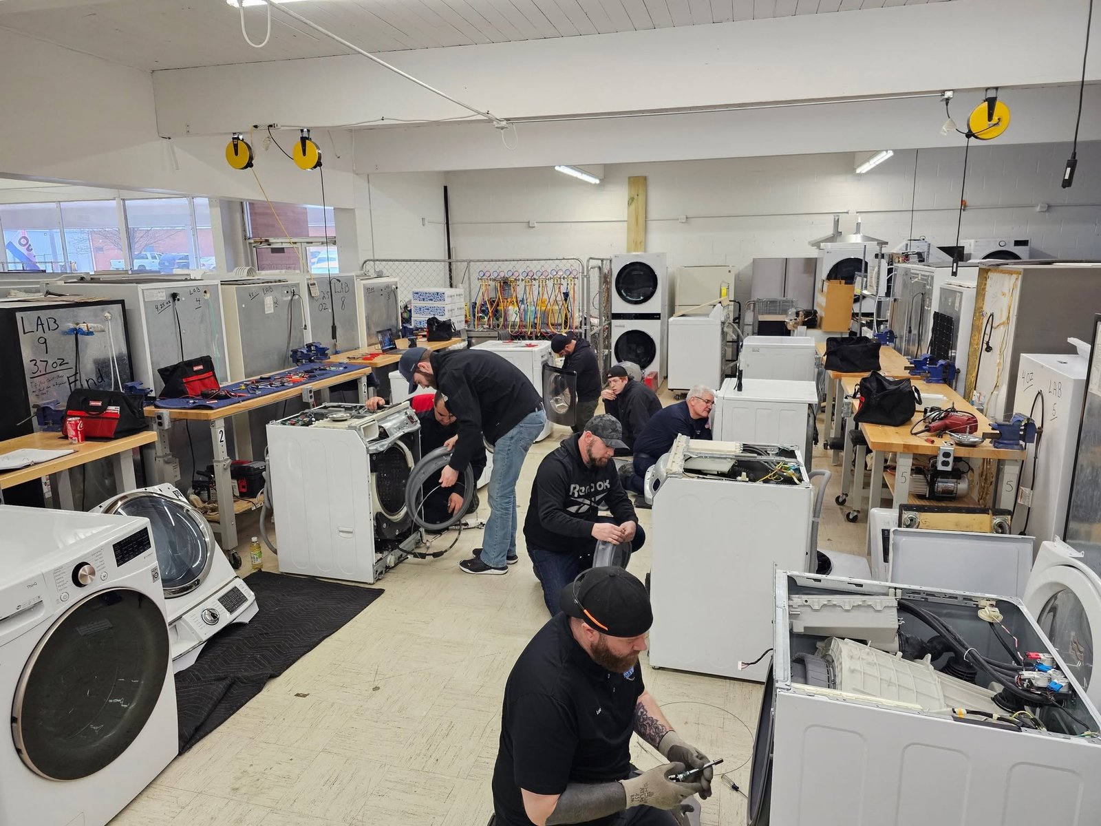 CityFix technician repairing a home appliance in Dubai